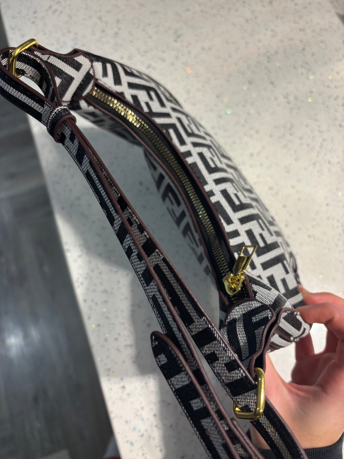 Ff grey bag with gold at the bottom