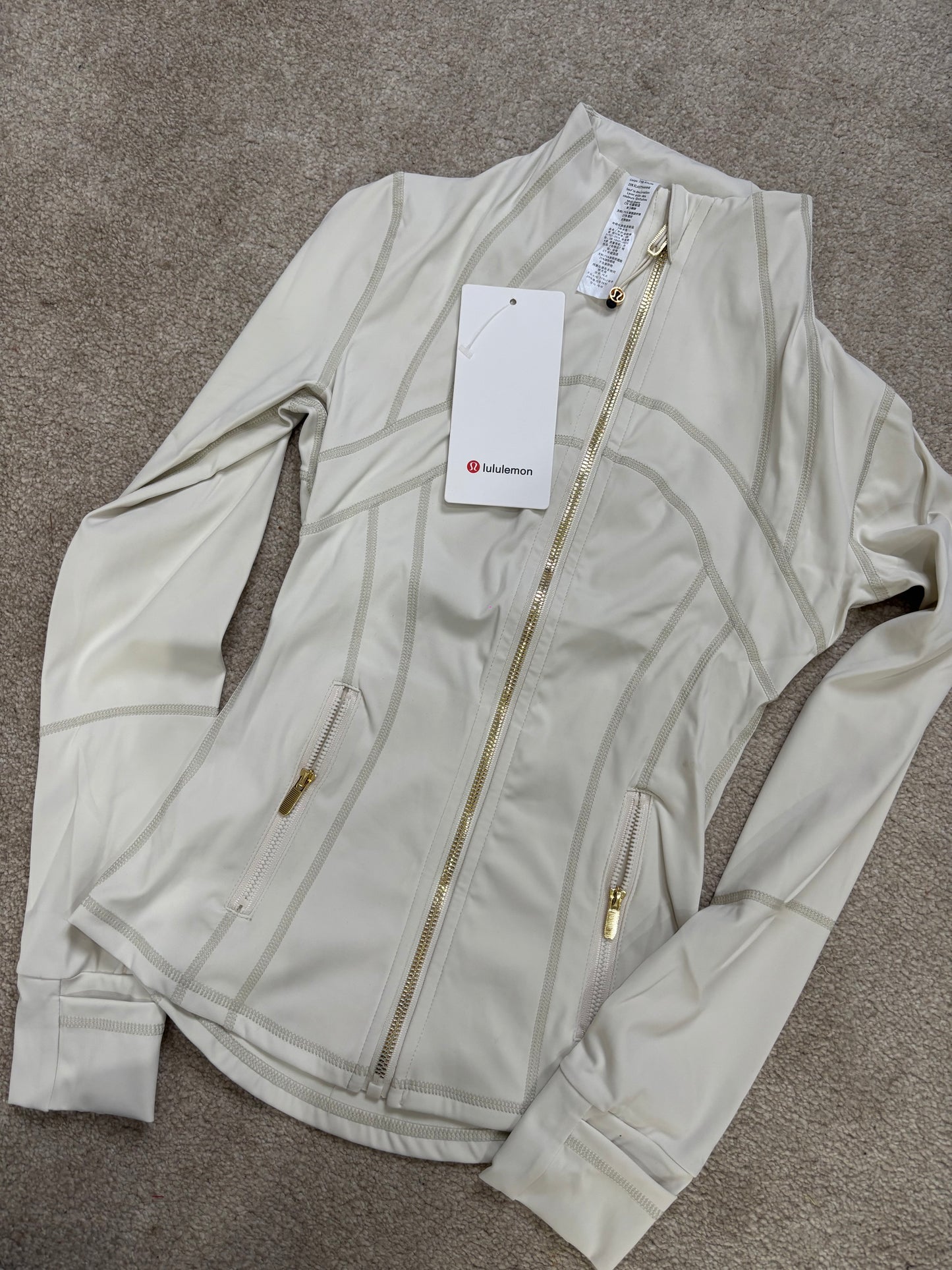 White & gold lululemon Gym jacket size 2