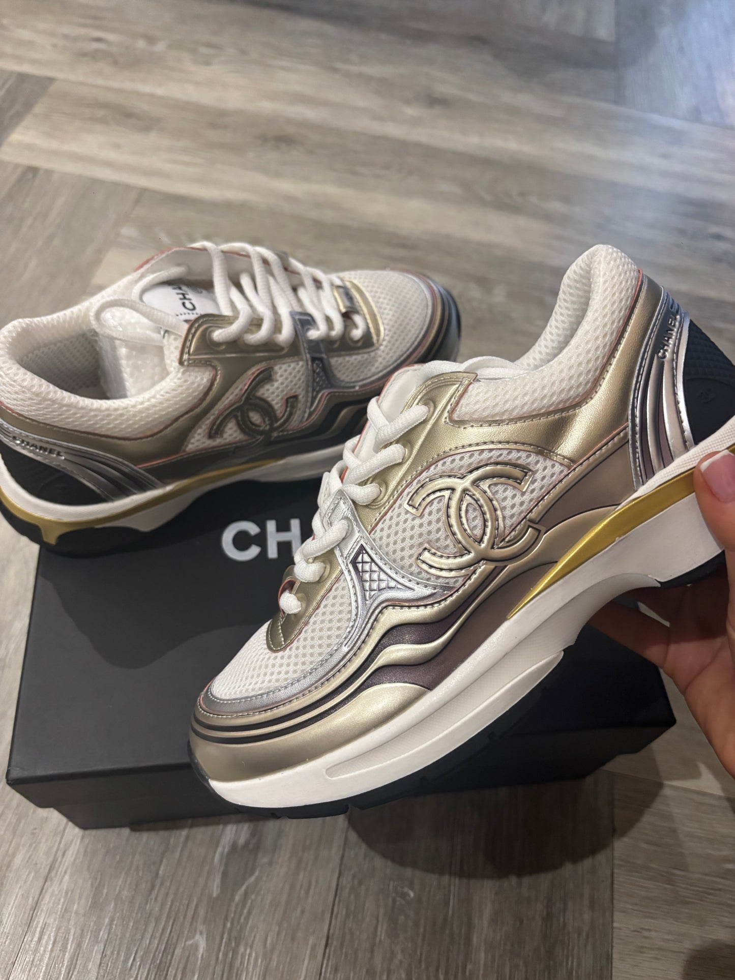 Gold cc trainers in stock