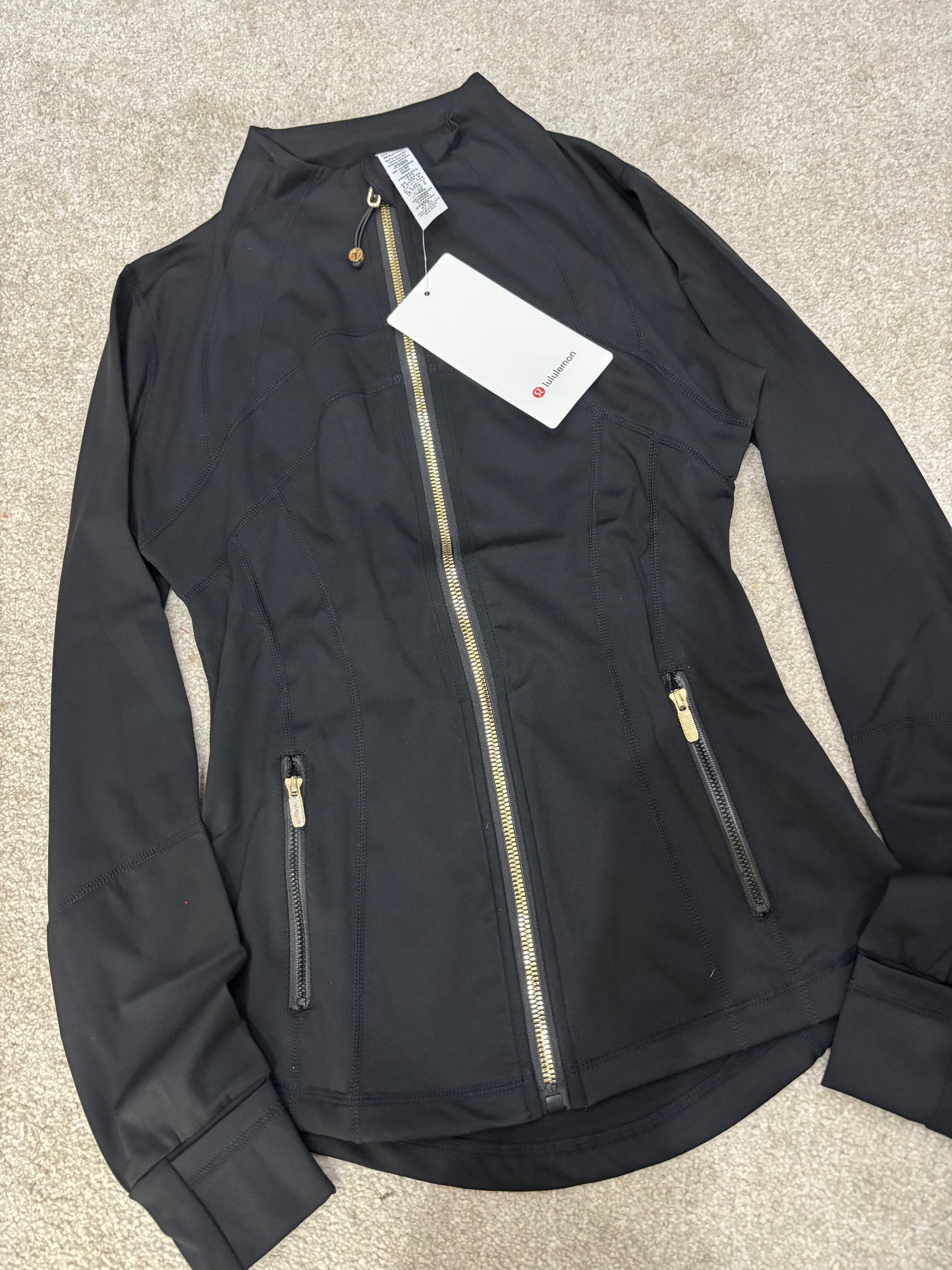 Black & gold lululemon gym jacket size 4