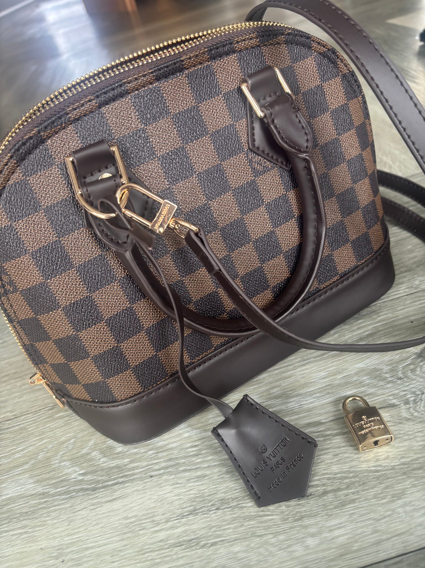 Grid handbag with long strap