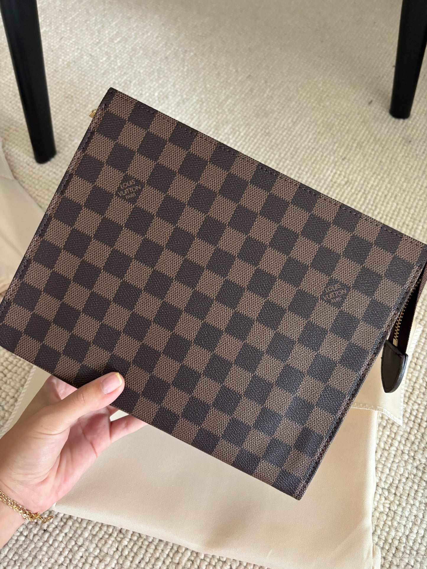 Brown grid clutch bag