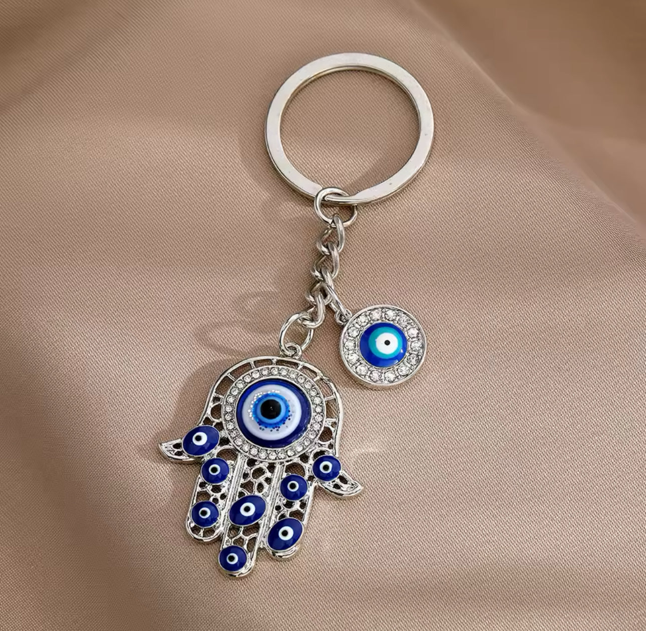 Silver evil eye hand keychain