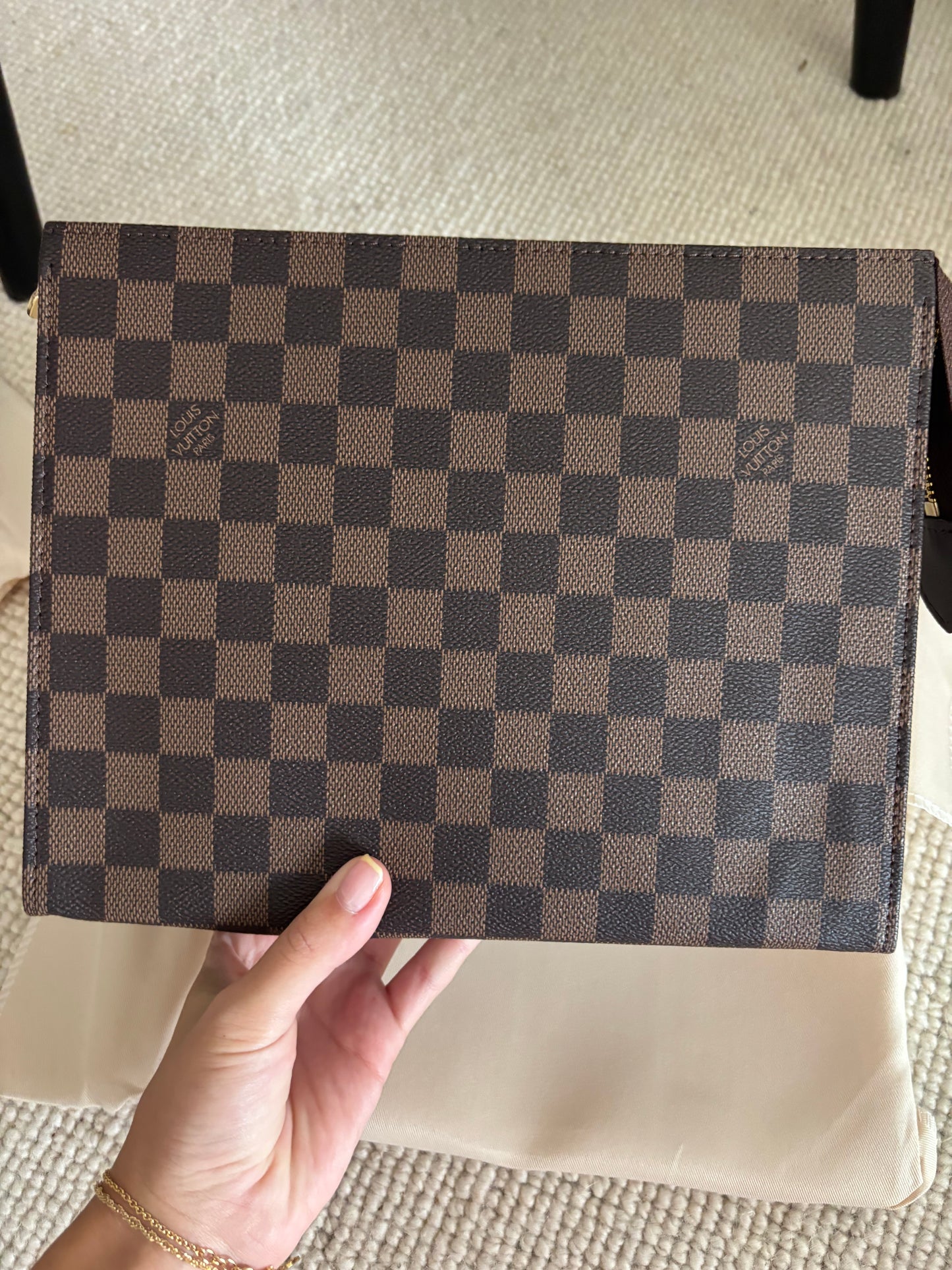 Brown grid clutch bag