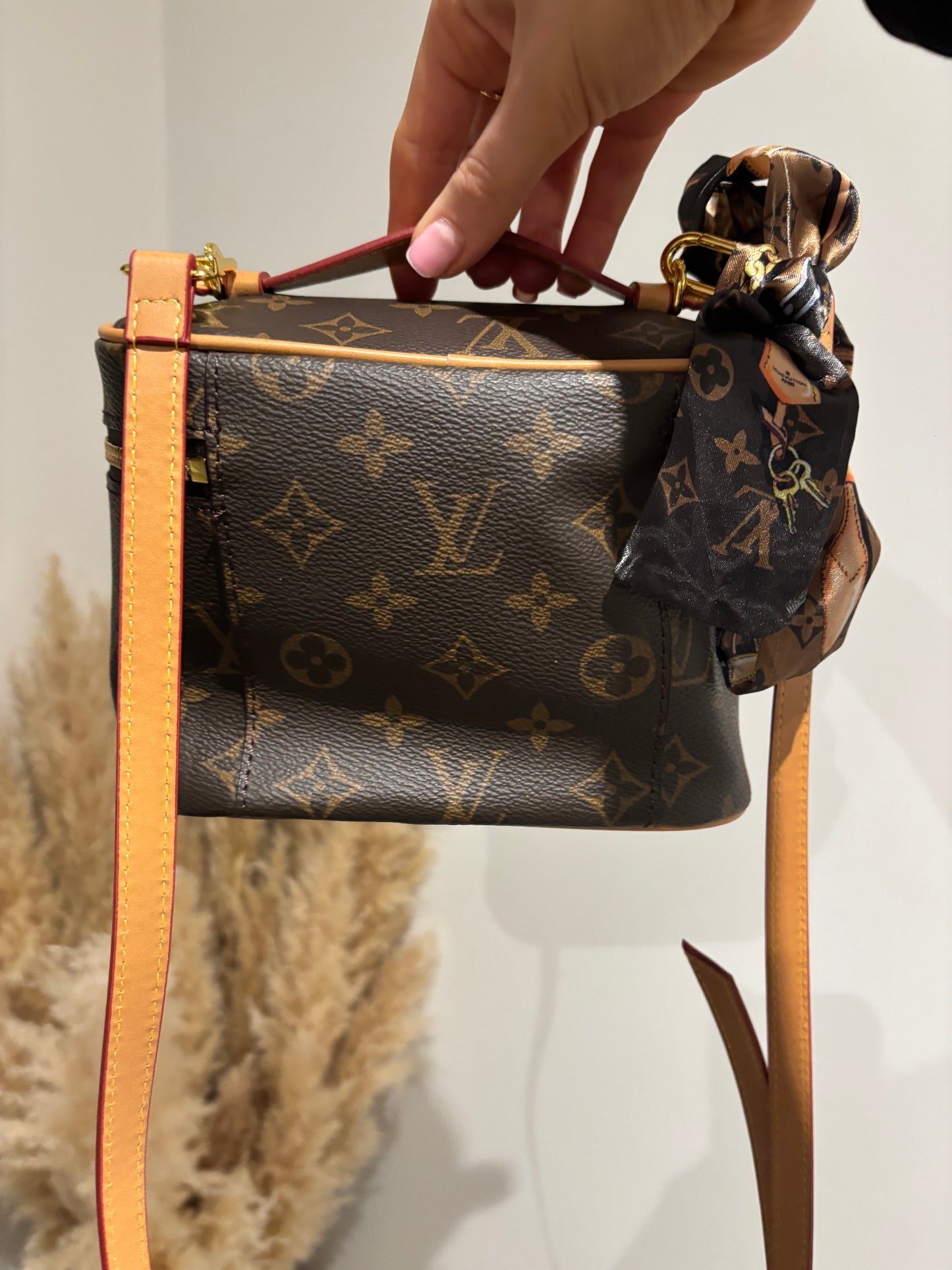 Brown flower makeup bag with long strap and scarf