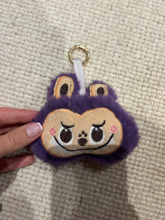 Purple fluffy Labubu head keychain