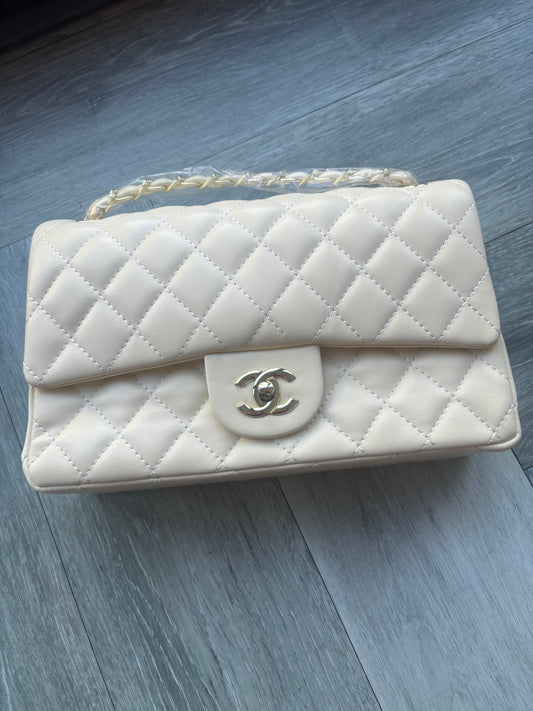 Yellow and gold cc crossover bag