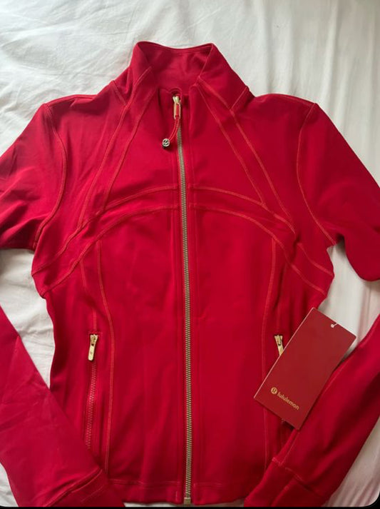 Red with gold zip Lulu lemon jacket gym top size 4