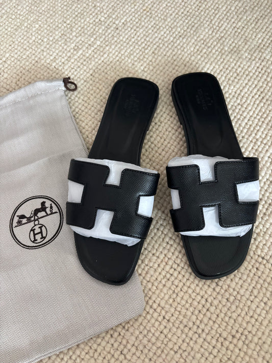 Black h Slidders size 5 with dust bag