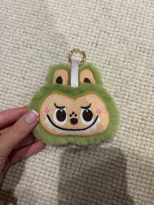 Green fluffy Labubu head keychain