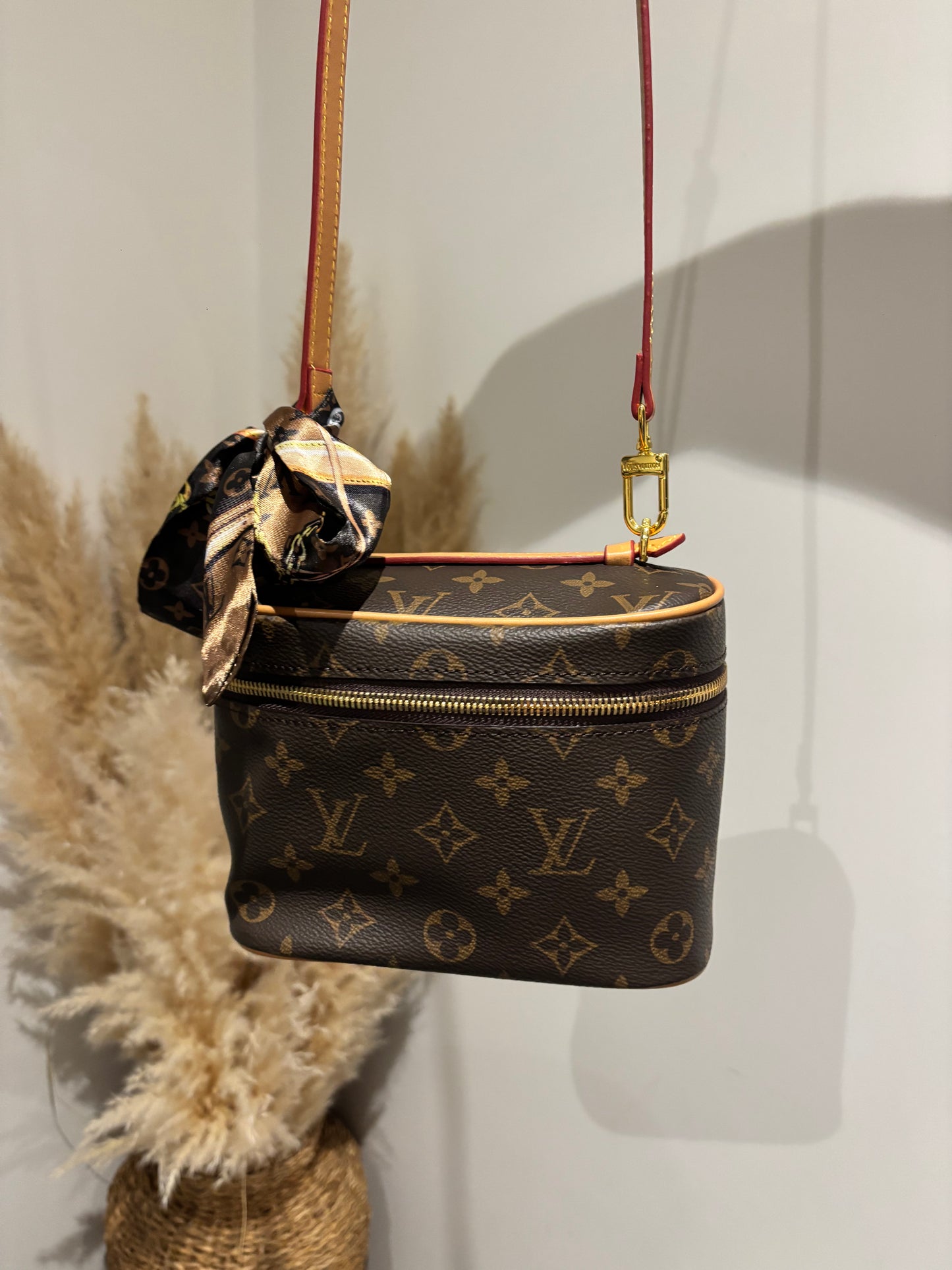 Brown flower makeup bag with long strap and scarf