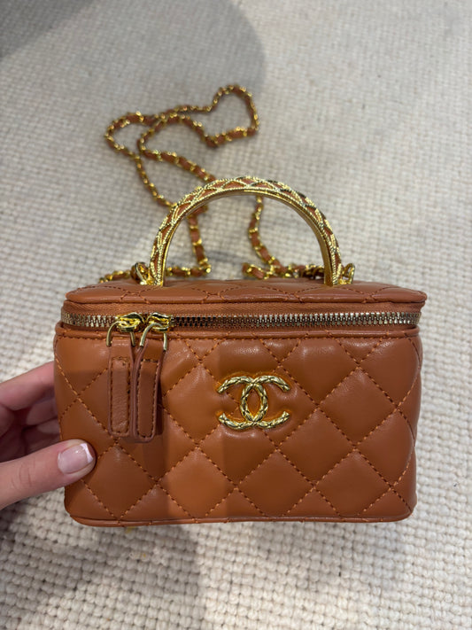 Brown cc box bag with long chain