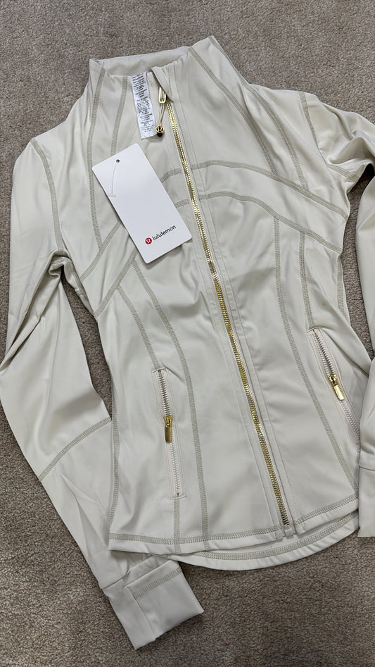 White & gold lululemon Gym jacket size 2