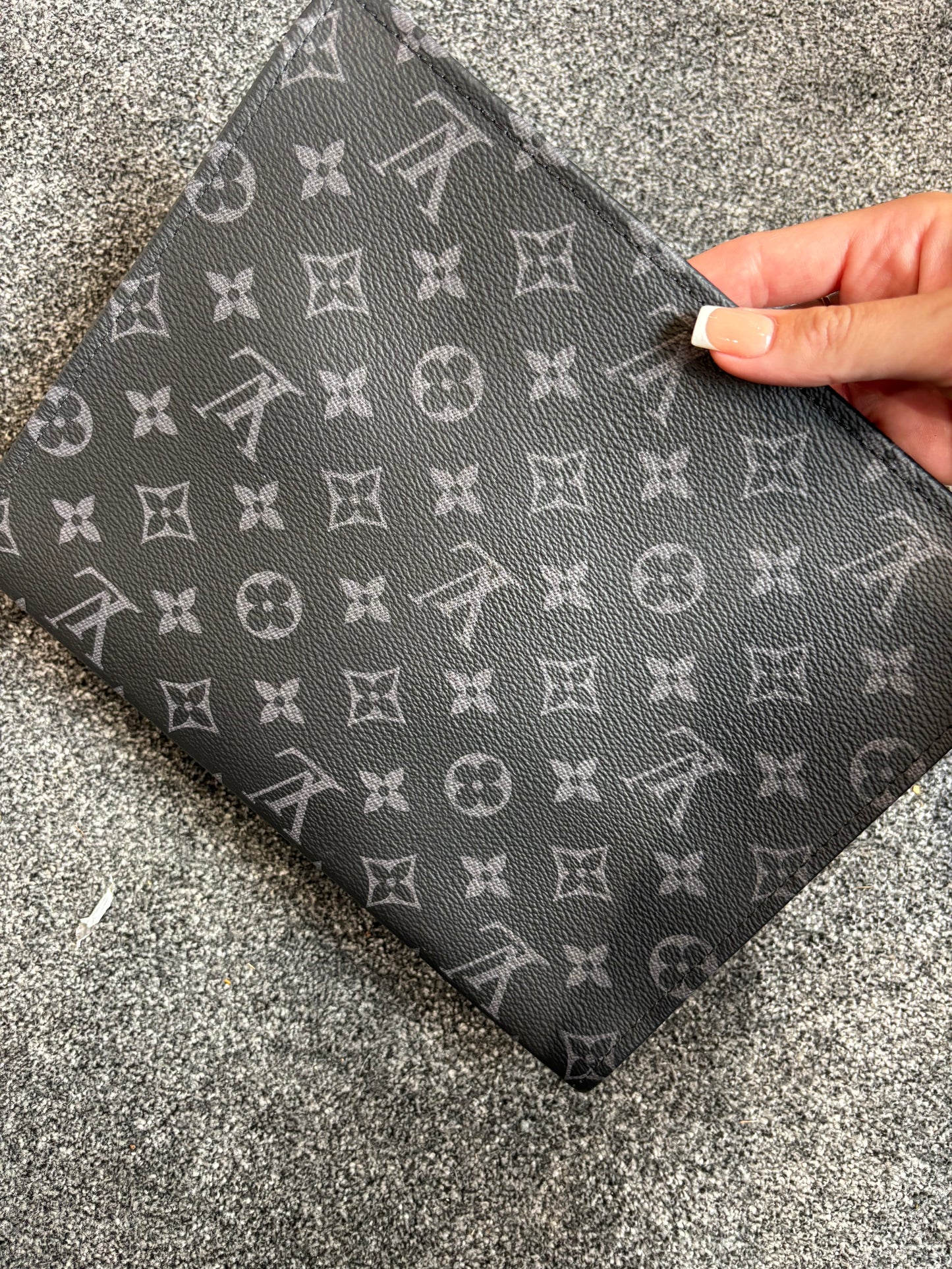 grey and black flower clutch bag