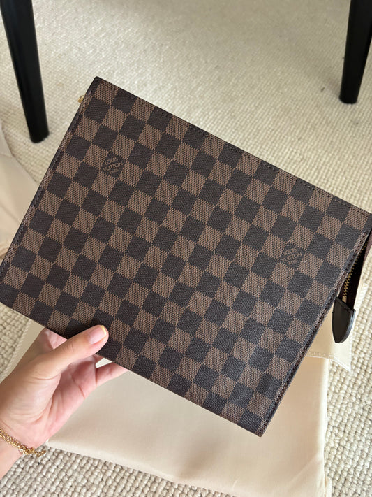 Brown grid clutch bag