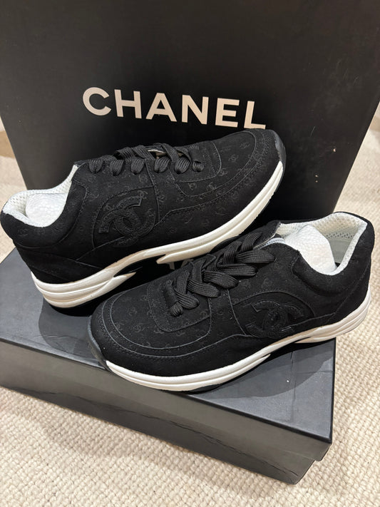 Black with tinny black cc trainers size 5