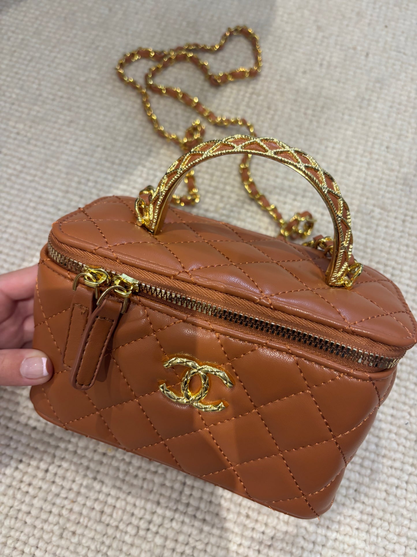 Brown cc box bag with long chain